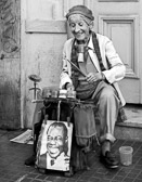 An older Buenos Aires street performer who still seems to enjoy her work.