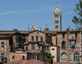 Another one of Siena's cathedrals provides a back drop to a view of the city's back side.