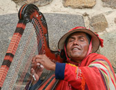 This blind harpist at the Sacred Valley plays music for the gods.